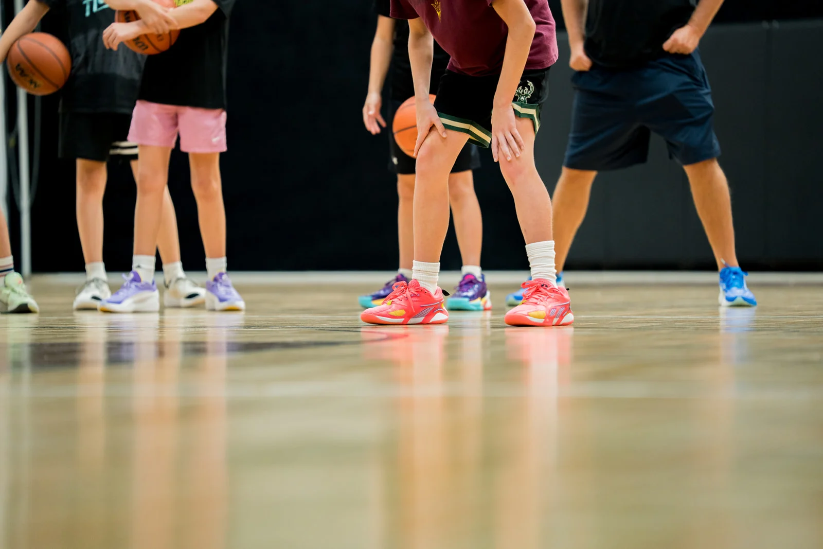 Young players in defensive stance during a DS Storm drill