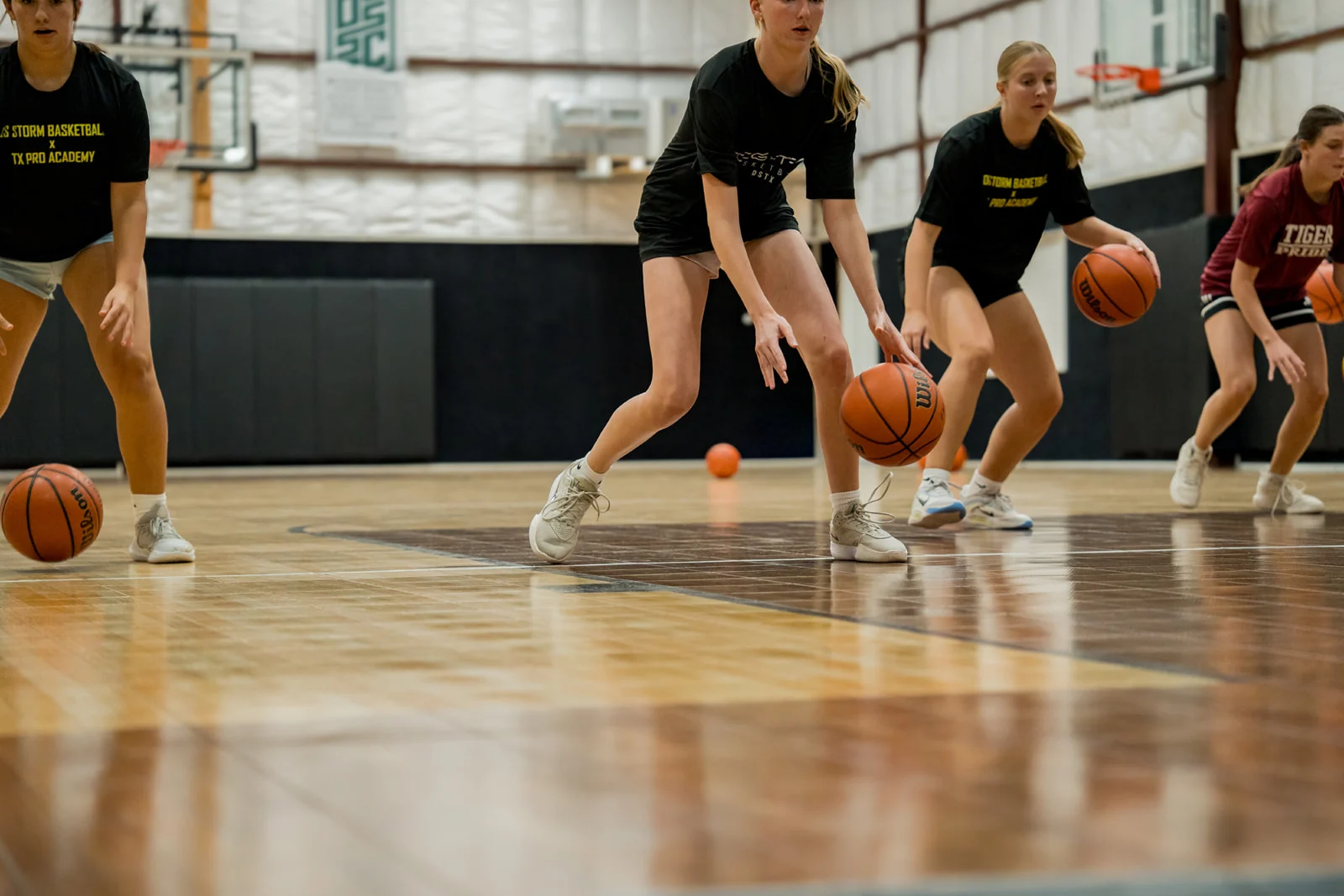 DS Storm players running a dribbling drill
