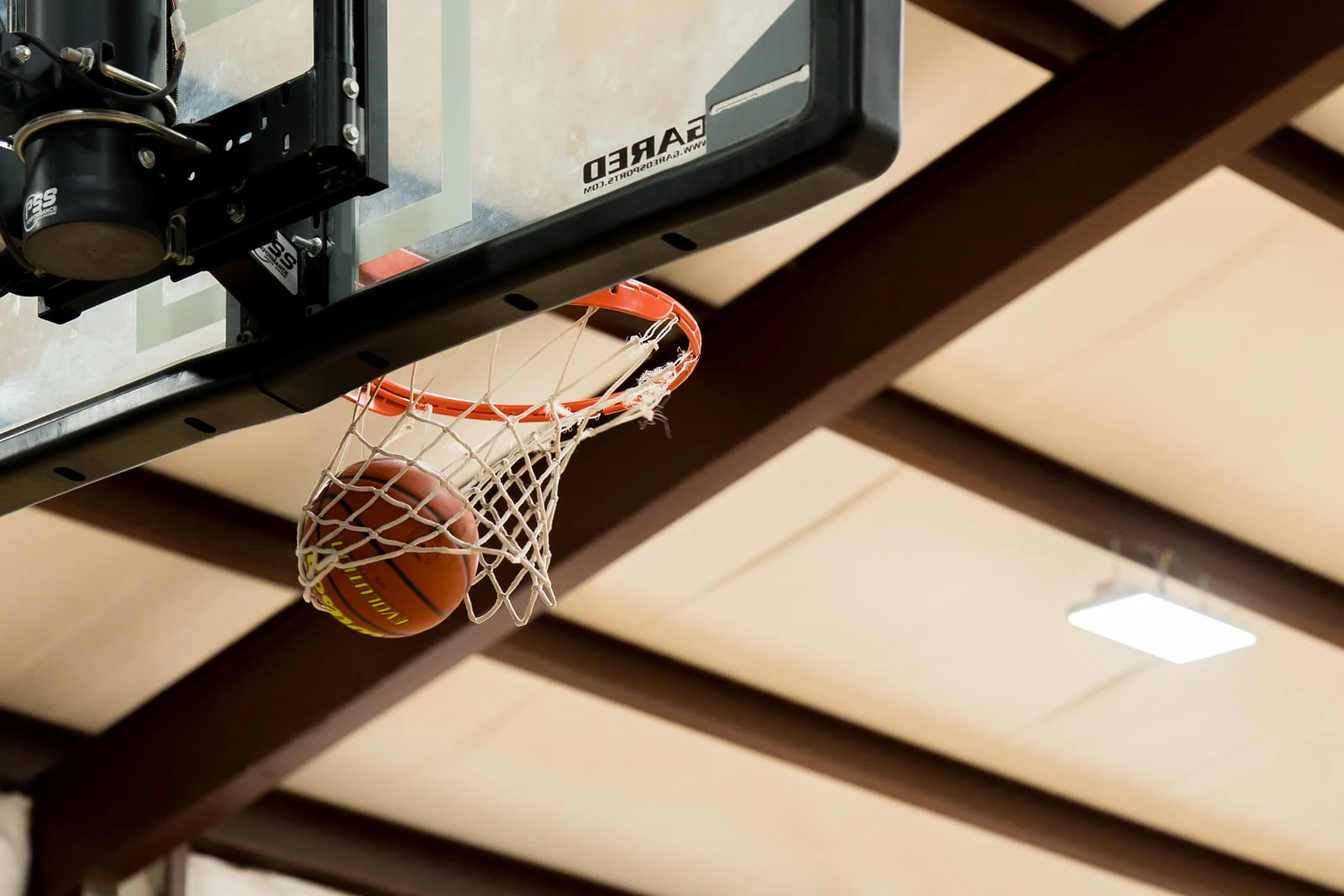 Basketball dropping through the net at DS Storm